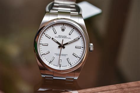 Rolex 114300 Oyster Perpetual White Dial .